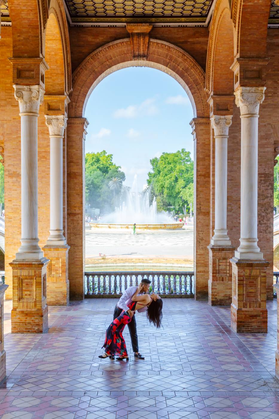 Rachel and Vinh under the arches in Seville
